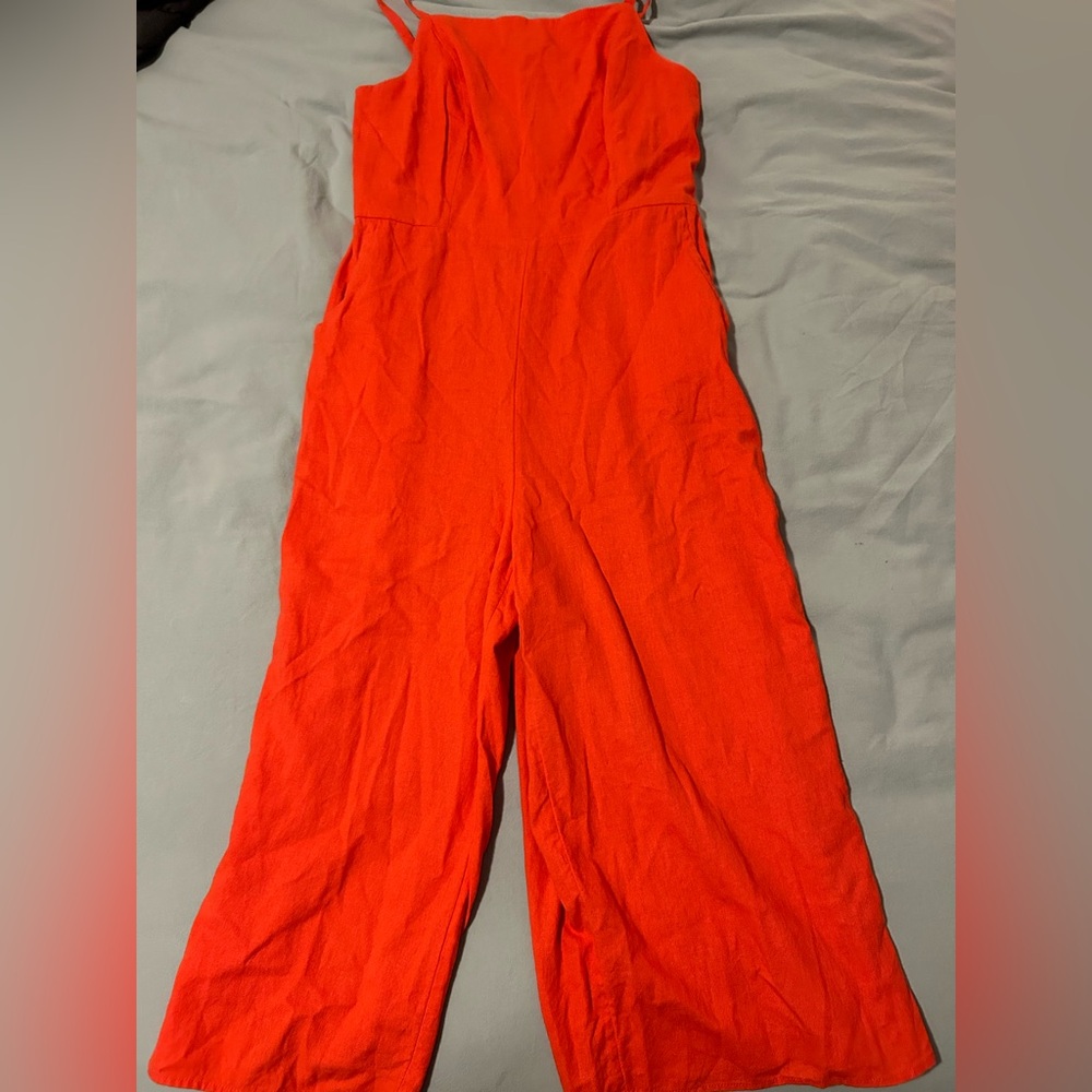 Red-orange bright and bold jumpsuit with pockets
